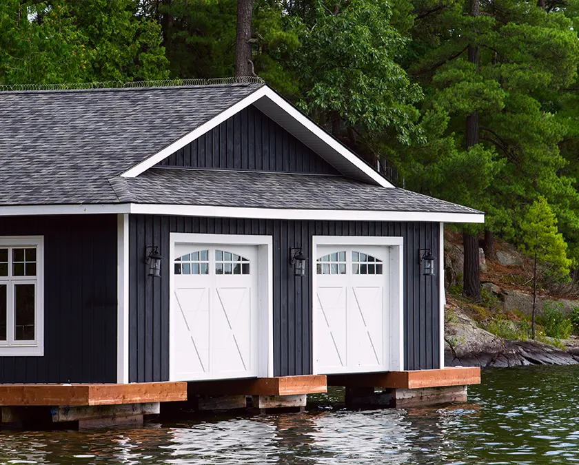 black-boathouse-with-dark-roofing