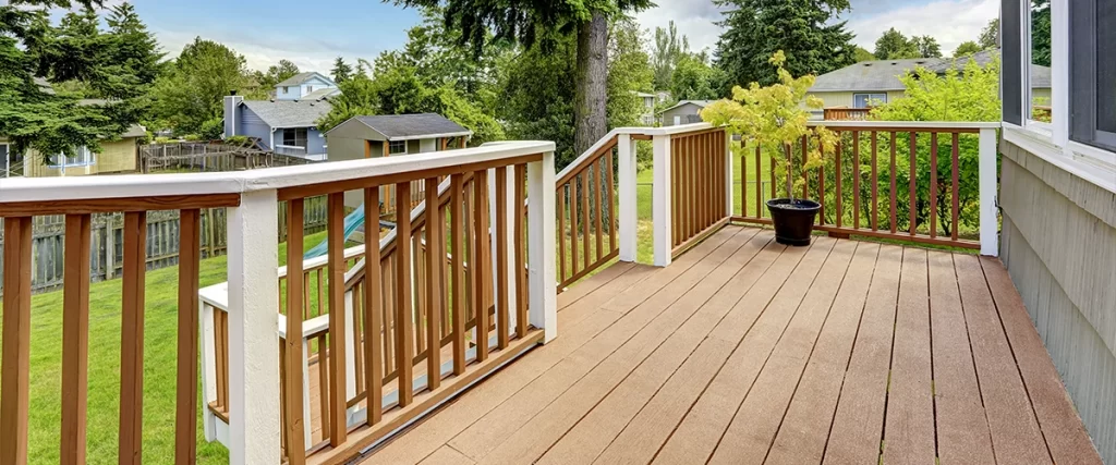 Trex decking with composite railing and posts painted white
