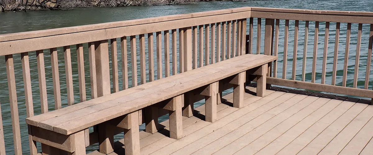 Composite decking rail with a built-in bench