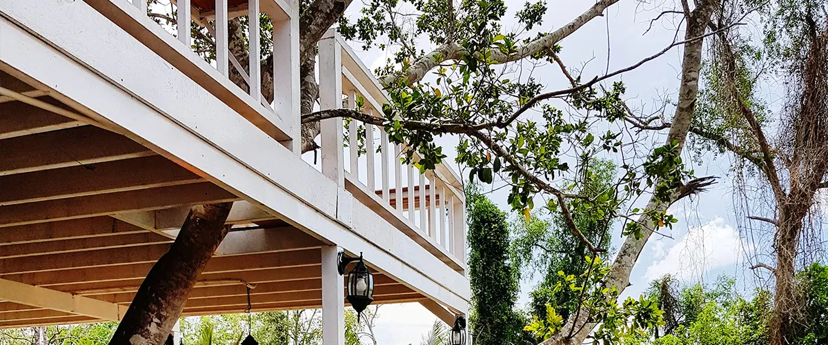 A white railing for an elevated deck that needed a building permit