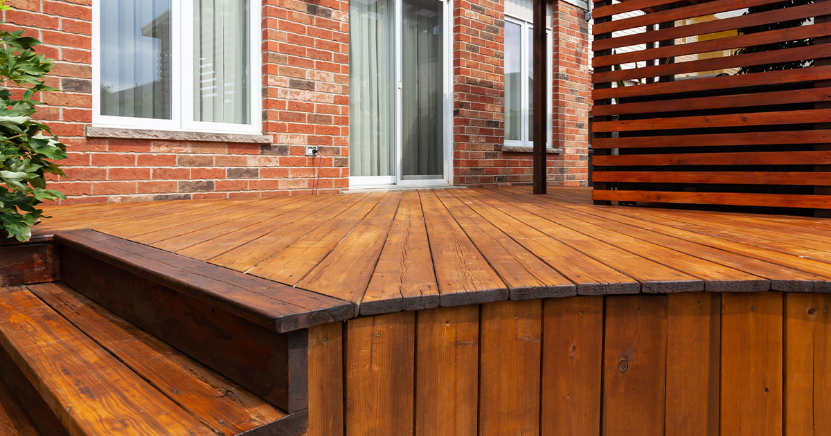 Cedar wood deck with stairs and no railing