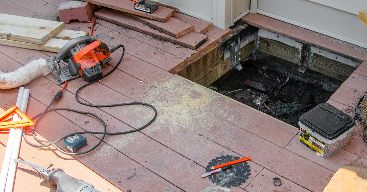 hole cut in deck for drainage issue