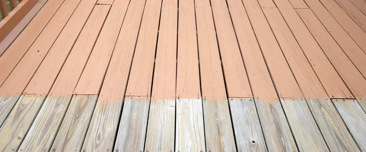 Newly painted wooden deck in Annapolis, with a two-tone finish, highlighting a DIY home improvement project for outdoor spaces. Painting Vs Staining A Deck In Annapolis, MD